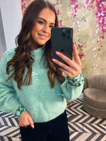 Green bow jumper