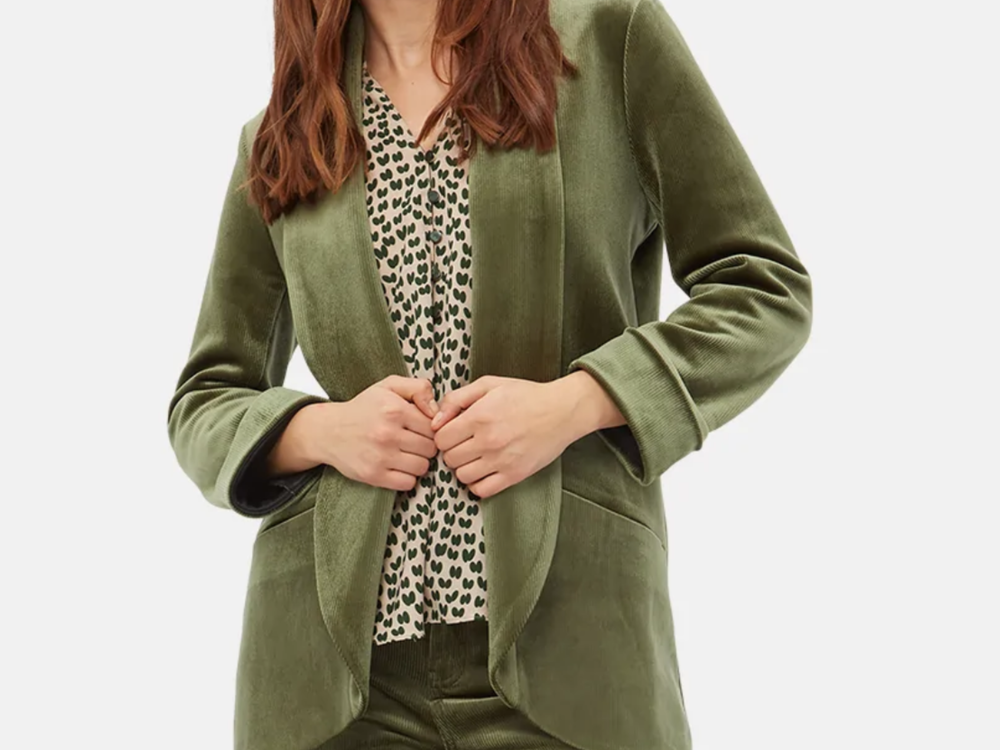 Green velvet cord flare trousers