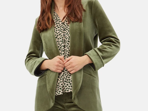 Green velvet cord flare trousers
