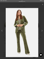 Green velvet cord flare trousers