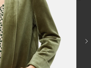 Green velvet cord flare trousers